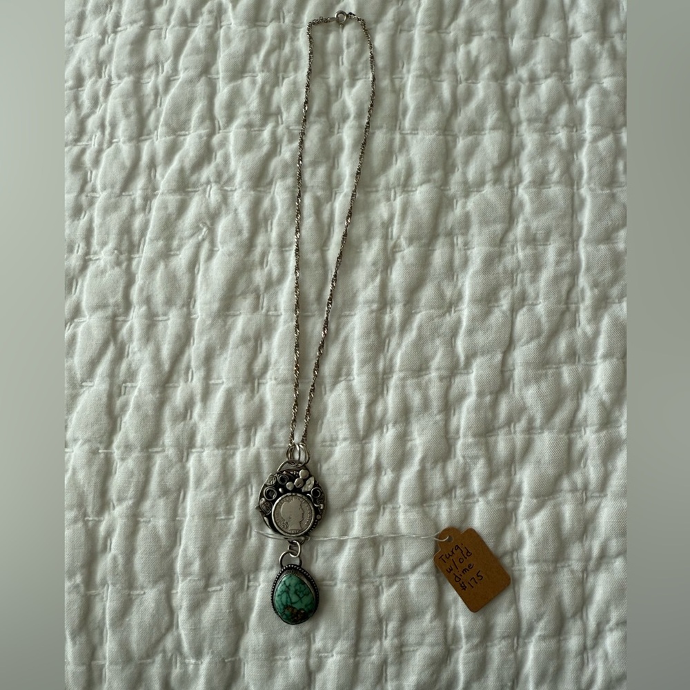 Elegant Silver and Turquoise Pendant Necklace